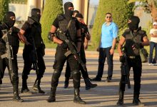 Egyptian police take their positions in front of the main gate at the Borg El Arab (Army) Stadium, where the Egyptian Premier League derby soccer match played without spectators due to ‘security reasons’, Alexandria, Egypt, 21 July 2015. Reuters, Amr Abdallah.