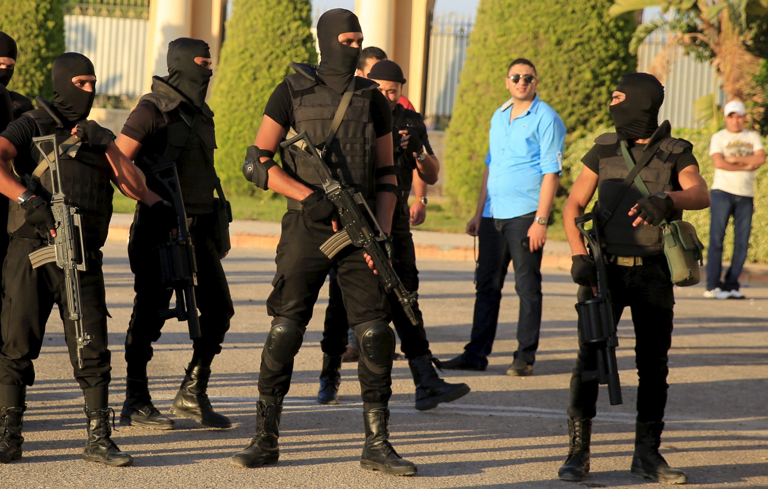 Egyptian police take their positions in front of the main gate at the Borg El Arab (Army) Stadium, where the Egyptian Premier League derby soccer match played without spectators due to ‘security reasons’, Alexandria, Egypt, 21 July 2015. Reuters, Amr Abdallah.