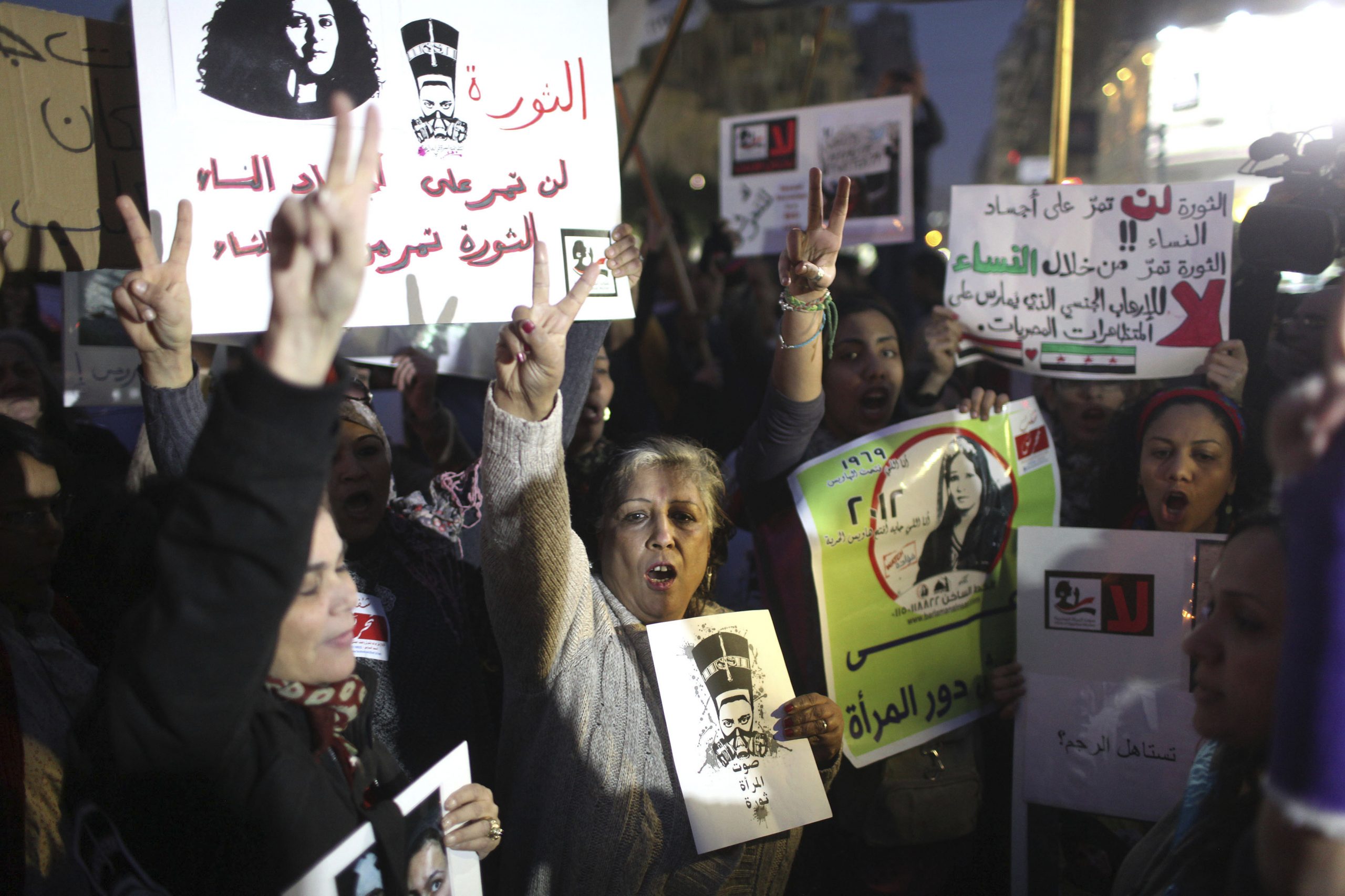 Women chant slogans as they participate in a protest against sexual harassment, central Cairo, 12 February 2013. Reuters/Asmaa Waguih.