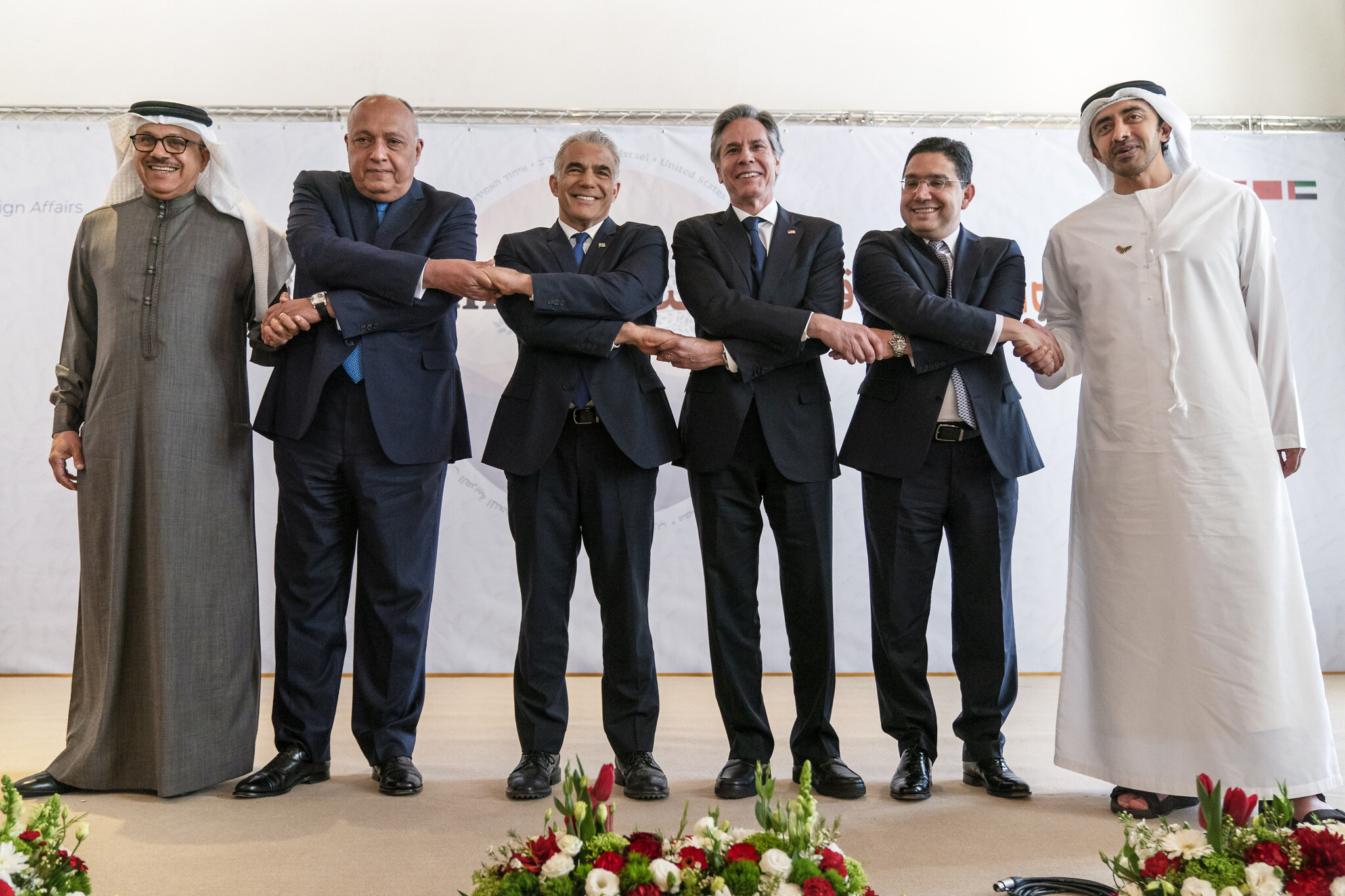 After meeting for the Naqab Summit, Bahrain's foreign minister Abdullatif bin Rashid al-Zayani, left, Egypt's foreign minister Sameh Shoukry, Israel's foreign minister Yair Lapid, United States Secretary of State Antony Blinken, Morocco's foreign minister Nasser Bourita, and United Arab Emirates' foreign minister Sheikh Abdullah bin Zayed Al Nahyan, pose for a photograph, 28 March 2022. AP, Jacquelyn Martin, via Aljazeera.