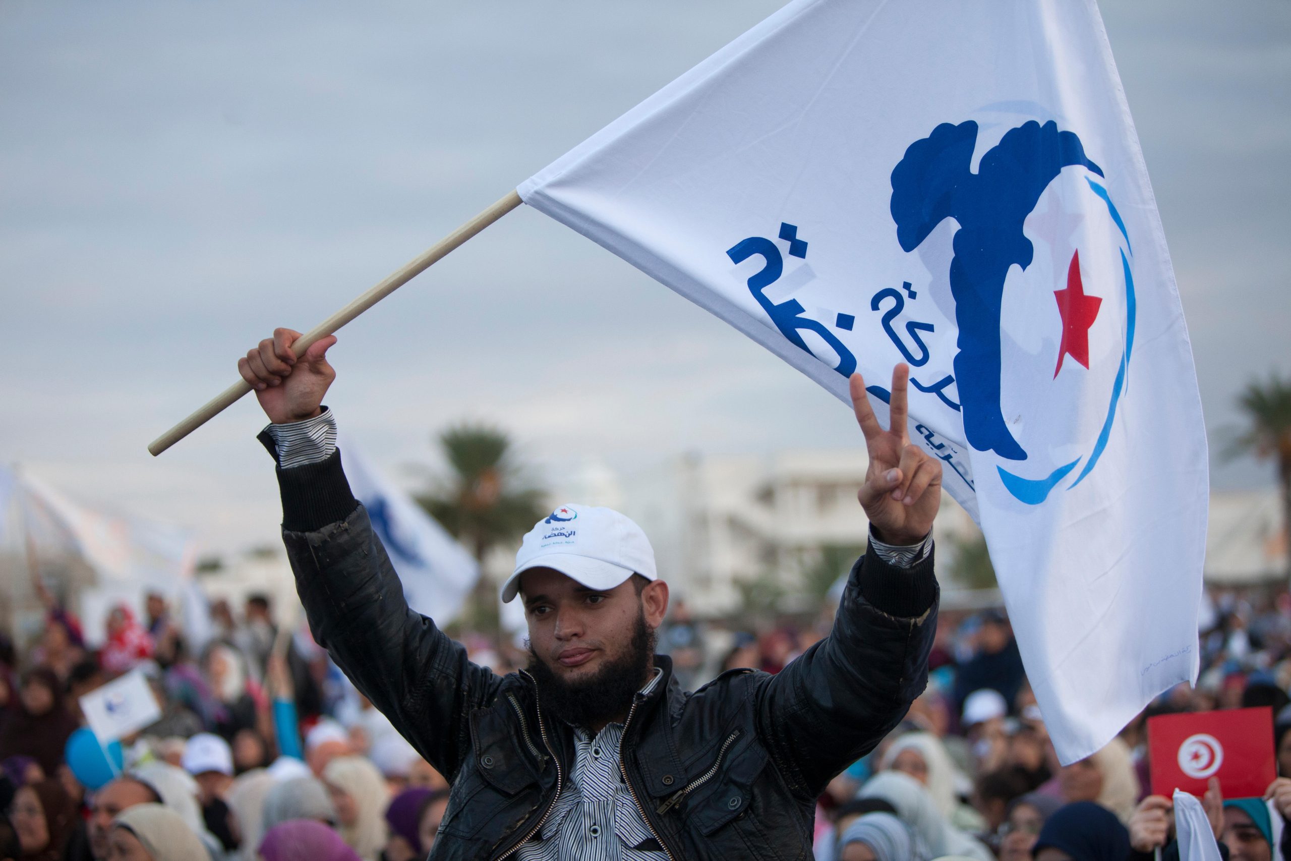 Activist with a flag of islamist party Ennahda during a rally before elections of the Constituent Assembly. 21 October 2011. Godong /Alamyvia .via Reuters