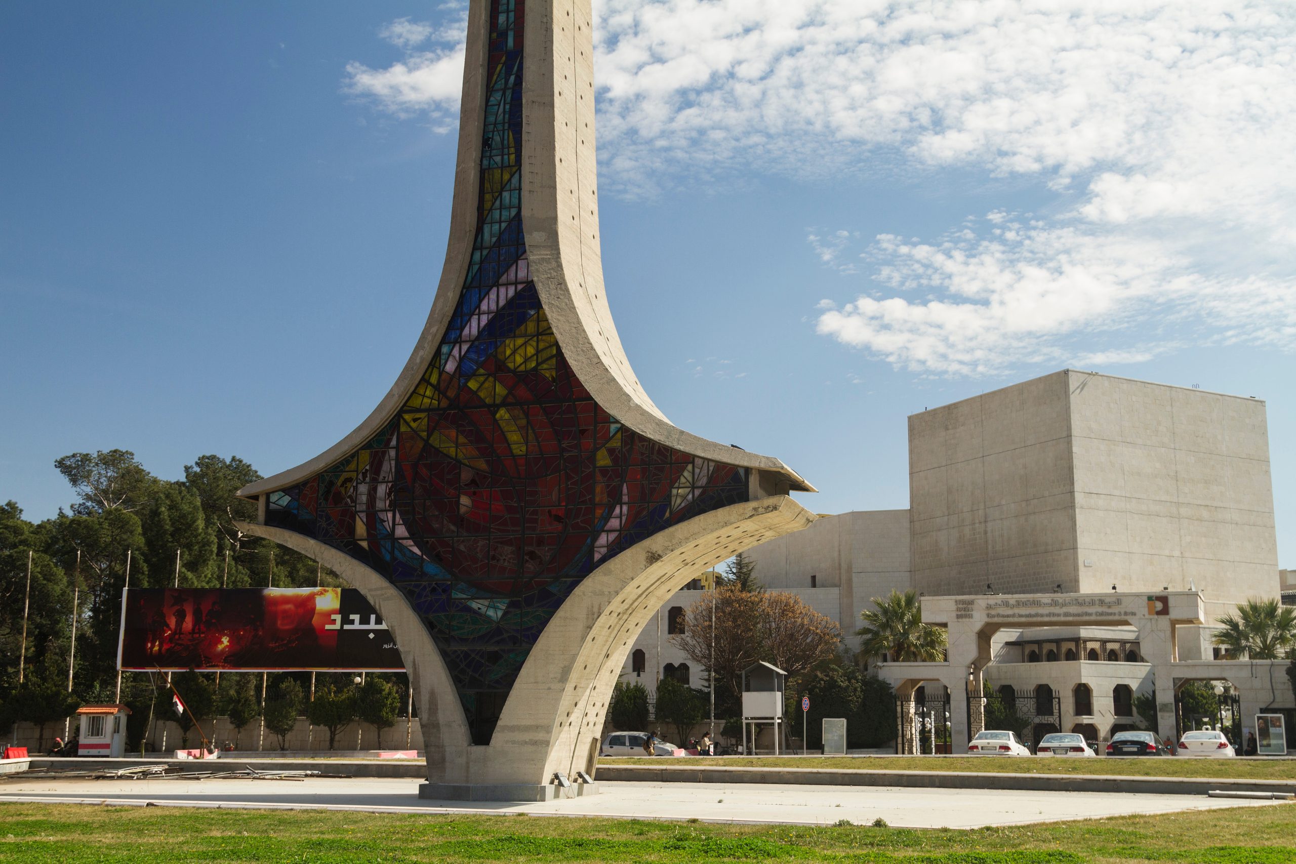 An image of the Damascene Sword monument located in front of the Damascus Opera House, officially known as Dar Al-Assad for Culture and Arts, 15 February 2016. Source: Shutterstock, photo by Goran Safarek.